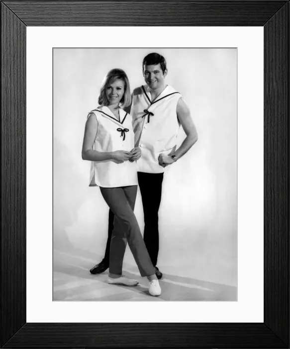 Framed Print : Reveille Fashions: Jill Carter, Mike Lester wearing sailor style fashion tops design to