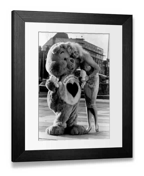 Framed Print : The Care Bears arrived with some small Bear gifts. They are pictured with Janine Andrews