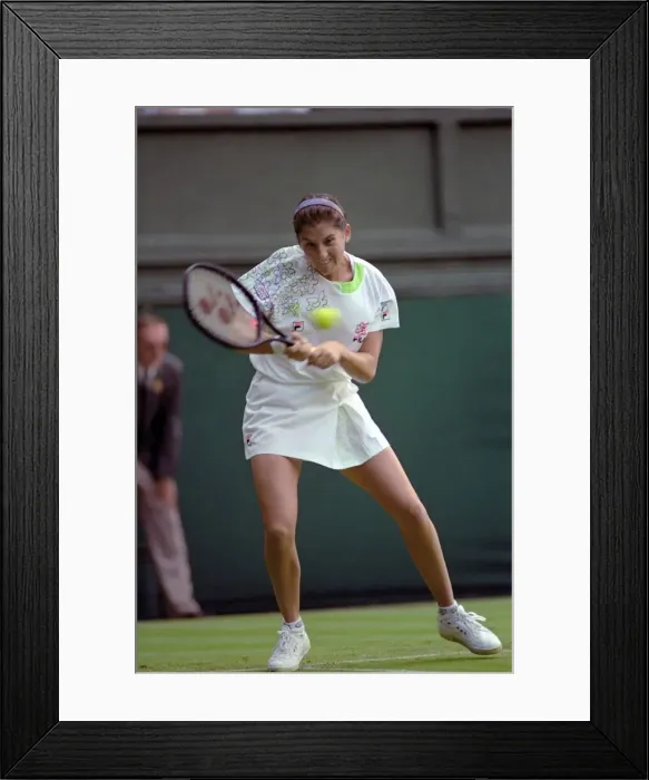 Framed Print : All England Lawn Tennis Championships at Wimbledon. Monica Seles in action during