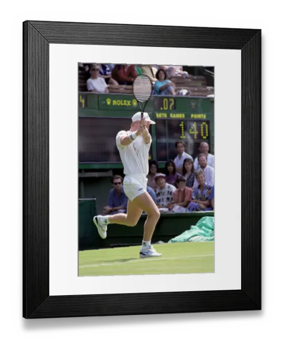 Framed Print : All England Lawn Tennis Championships at Wimbledon. Jim Courier in action during Framed Print : All England Lawn Tennis Championships at Wimbledon. Jim Courier in action during