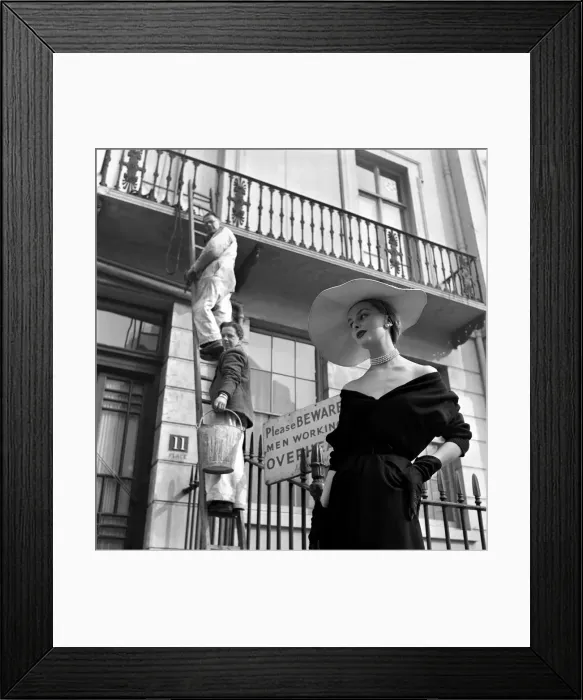 Framed Print : 20 year old french model Elyette Mouret has no need to beware of the workmen when she Framed Print : 20 year old french model Elyette Mouret has no need to beware of the workmen when she