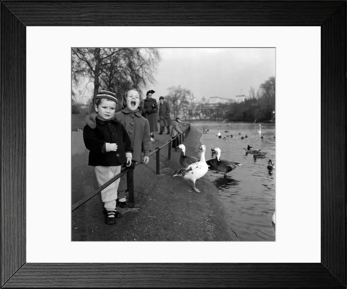 Framed Print : Matti Fastinen and his sister Mer-inkeri Fastinen seen here modelling childrens Finnish