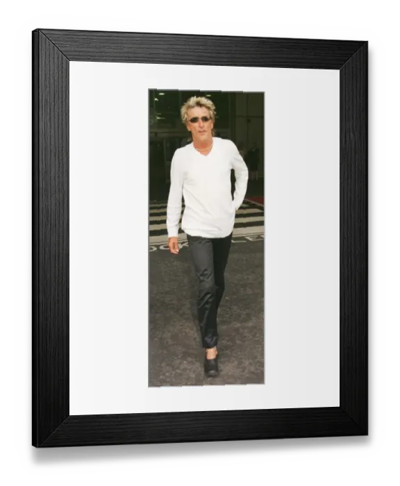 Framed Print : Rod Stewart arrives at Heathrow Airport May 1999 from Los Angeles