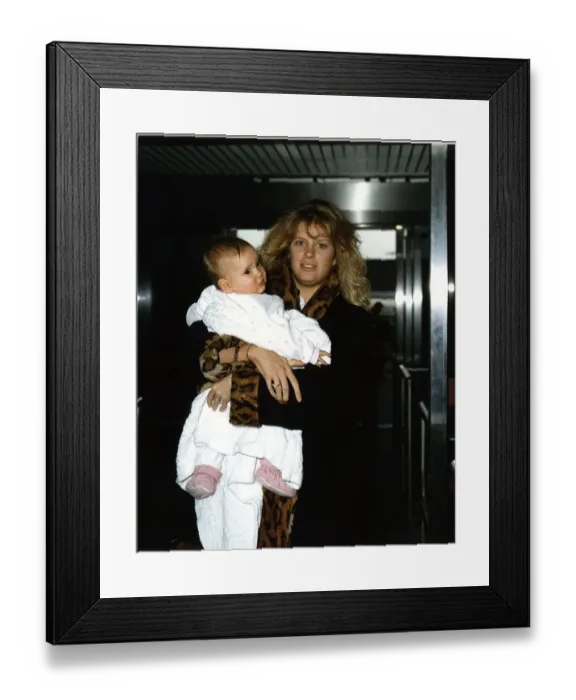 Framed Print : Rachel Hunter model wife of Rod Stewart with baby daughter