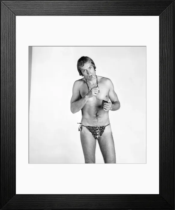 Framed Print : Man / Humour / Unusual. Male Thong Worn by Mack Eagles. March 1975 75-01663-002 Framed Print : Man / Humour / Unusual. Male Thong Worn by Mack Eagles. March 1975 75-01663-002