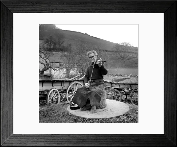 Framed Print : Mr. Harry Horrobin playing his violin outside. January 1975 75-00196 Framed Print : Mr. Harry Horrobin playing his violin outside. January 1975 75-00196