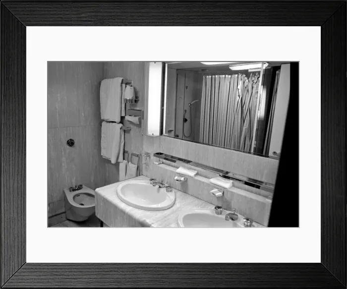 Framed Print : Interior view showing one of the cabin bathrooms aboard the luxury passenger liner QE2