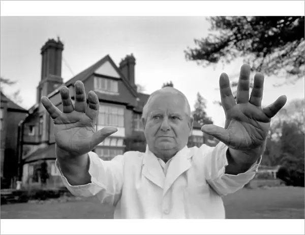 Faith Healer Mr. Harry Edwards shows of his hands. January 1975 75-00325