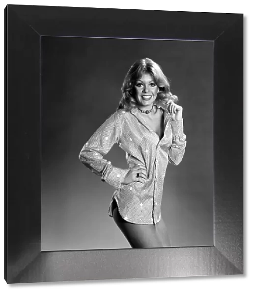 Glamour girl model Beverley Pilkington wearing a blouse. January 1975 75-00027