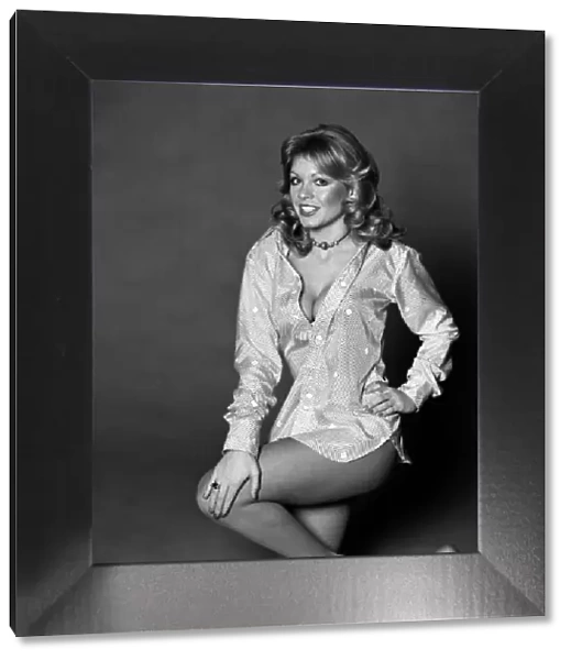 Glamour girl model Beverley Pilkington wearing a blouse. January 1975 75-00027-001