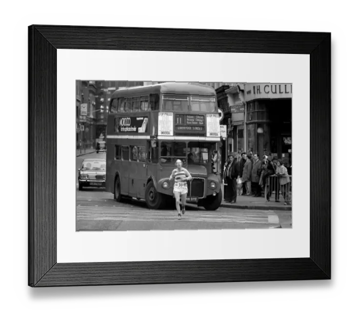 Framed Print : New Years Day Races in the City of London January 1975. Runner with double Framed Print : New Years Day Races in the City of London January 1975. Runner with double