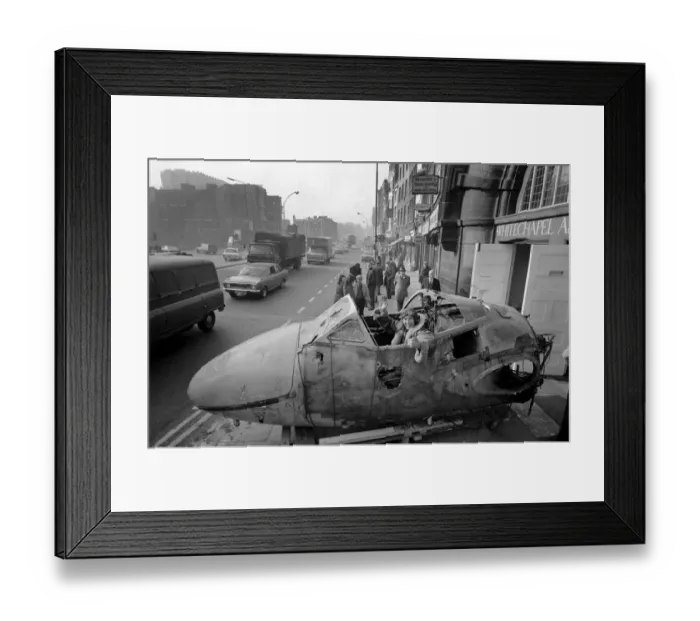 Framed Print : Aircraft arrives in Whitechapel High Street for art show Framed Print : Aircraft arrives in Whitechapel High Street for art show