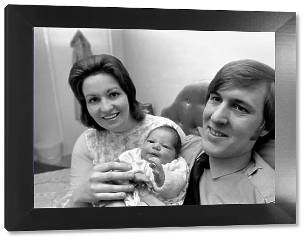 Fireman Sandy Durnall and Mrs Ann Murray and baby David John. January 1975 75-00152