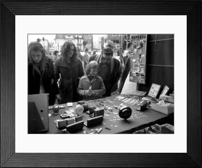 Framed Print : Last of the big spenders at Petticoat Lane. The moment of decision for 8-year-old Deborah Framed Print : Last of the big spenders at Petticoat Lane. The moment of decision for 8-year-old Deborah