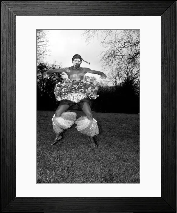 Framed Print : African Dancing: Ghanan Dancers. One of the dancers complete with war paint seen Framed Print : African Dancing: Ghanan Dancers. One of the dancers complete with war paint seen