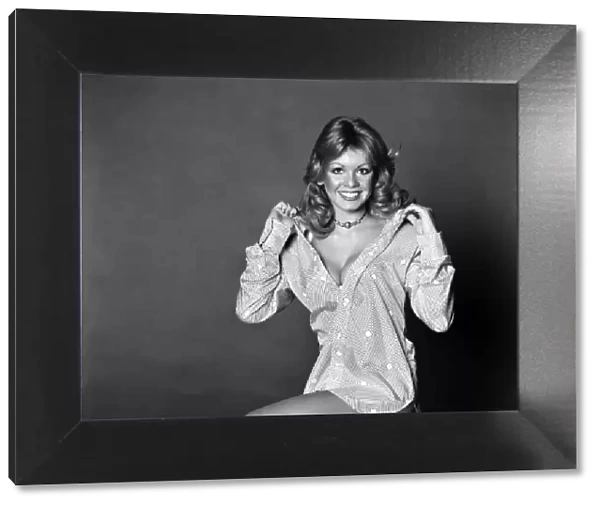 Glamour girl model Beverley Pilkington wearing a blouse. January 1975 75-00027-003