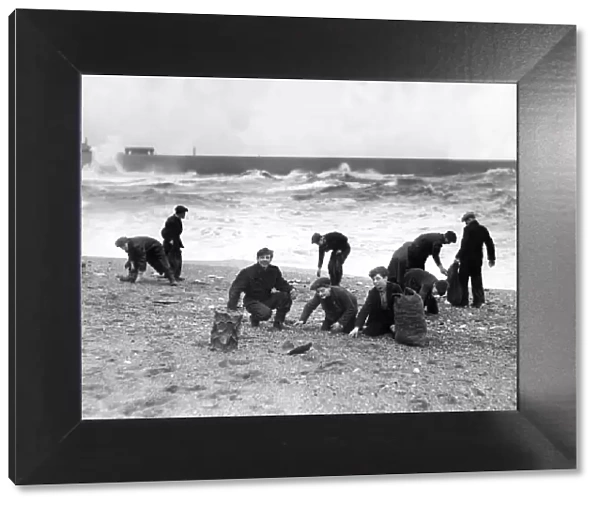 Coal gatherers on the beach at Hendon, Sunderland run for it as the big breakers roll up
