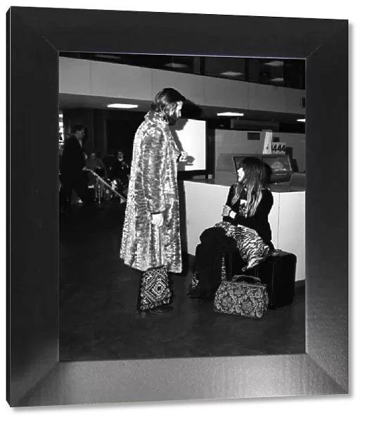Ringo Starr and wife Maureen at Heathrow airport. April 1971 71-3731-001