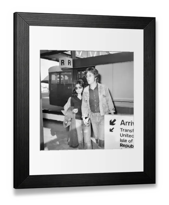 Framed Print : John Lennon and Yoko Ono on arrival at London Airport after returning from Majorca Framed Print : John Lennon and Yoko Ono on arrival at London Airport after returning from Majorca