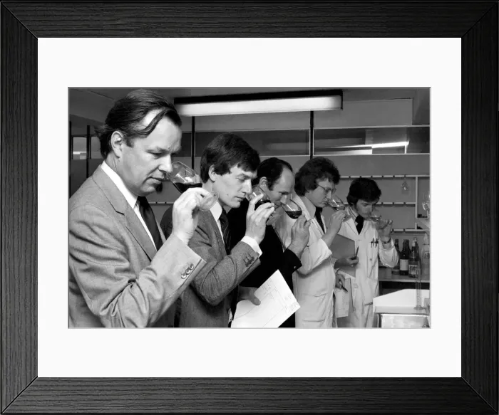 Framed Print : Wine Tasters sampling the latest consignment of red wine from the Beaujolais region of