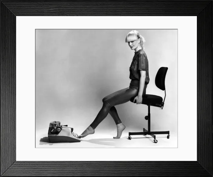Framed Print : The Typewriter: - Using portable typewriter, place on floor Framed Print : The Typewriter: - Using portable typewriter, place on floor