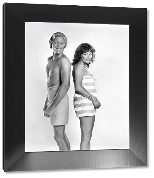 Models pose as a shy couple in the studio August 1977 77-04388-009