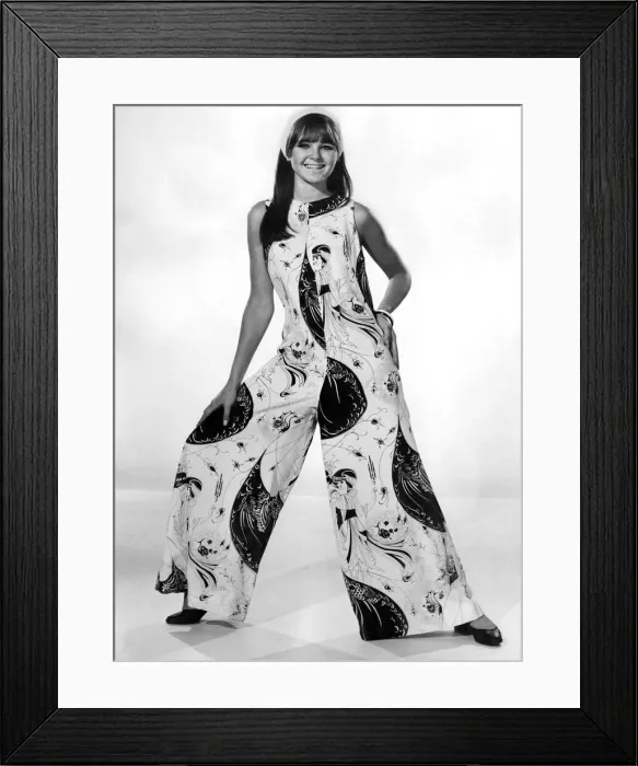 Framed Print : Reveille Patterns. Joanne Young wears an all in one trouser suit Framed Print : Reveille Patterns. Joanne Young wears an all in one trouser suit