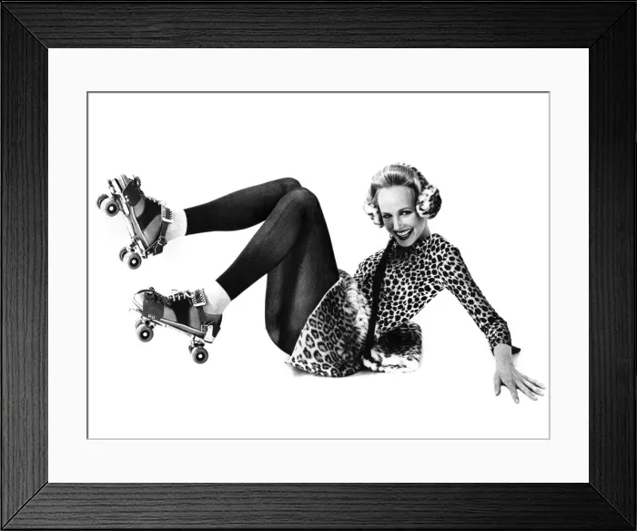 Framed Print : Skate Mate. Leopard-look mini-skirt, muff and ear-muffs Framed Print : Skate Mate. Leopard-look mini-skirt, muff and ear-muffs