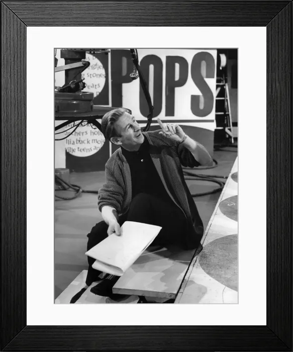 Framed Print : 50th top of the pop show, BBC TV Studios, Mr Producer Johnnie Stewart at work on this