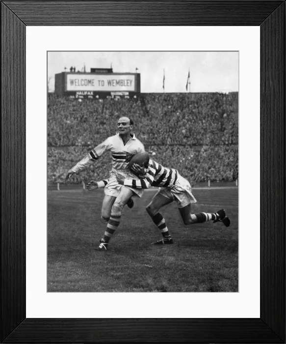 Framed Print : Brian Bevan of Warrington is well tackled by D. R. Bevan of Halifax. April 1954 P005845 Framed Print : Brian Bevan of Warrington is well tackled by D. R. Bevan of Halifax. April 1954 P005845