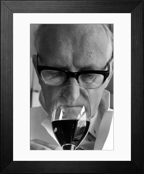 Framed Print : Wine Taster sampling the latest consignment of red wine from the Beaujolais region of Framed Print : Wine Taster sampling the latest consignment of red wine from the Beaujolais region of