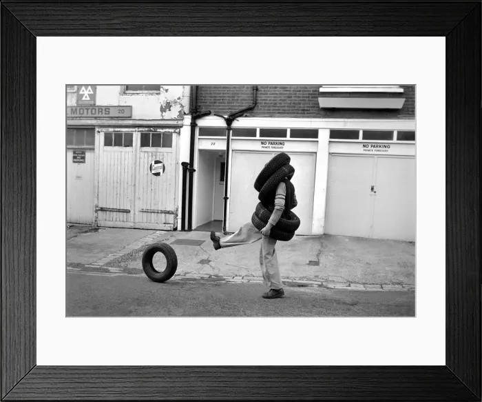 Framed Print : Unusual  /  Man  /  Tyres  /  Humour  /  Comedy. All Tyred up Brighton Tyre Fitter