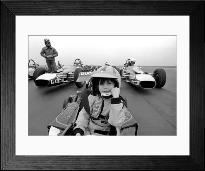 Framed Print : Angela four year old daughter of Ken James seen here at the wheel of her miniature petrol