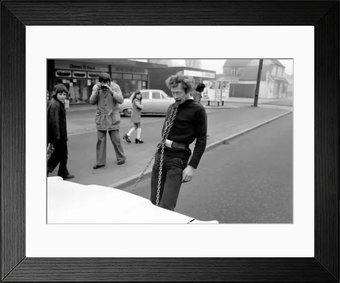 Framed Print : Strongman Reg Morris pulls car and passengers with his teeth. February 1975 75-00777-008 Framed Print : Strongman Reg Morris pulls car and passengers with his teeth. February 1975 75-00777-008