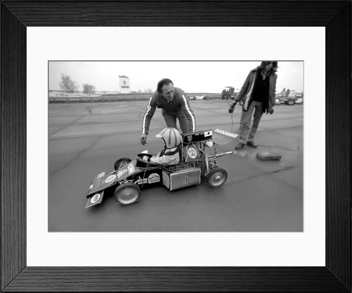 Framed Print : Angela four year old daughter of Ken James seen here at the wheel of her miniature petrol