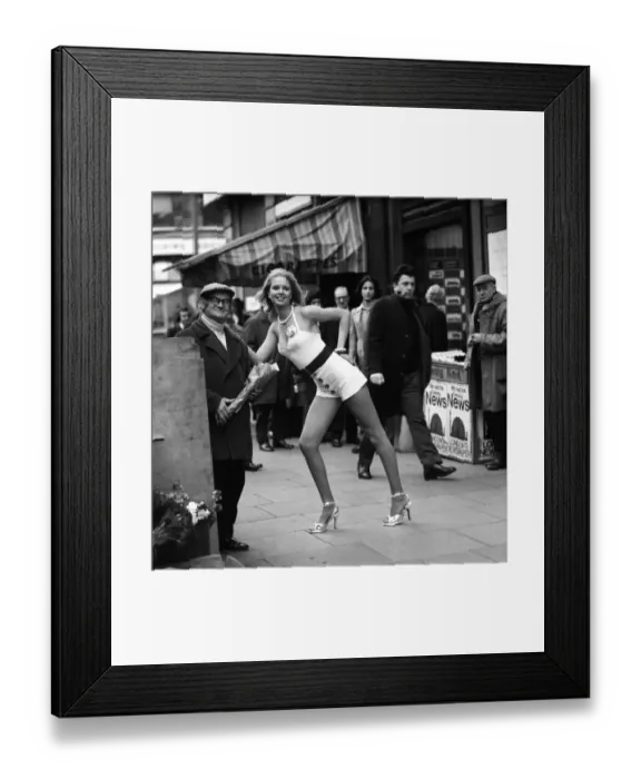 Framed Print : A London flower seller says it with flowers when he met model Christine Donna Framed Print : A London flower seller says it with flowers when he met model Christine Donna