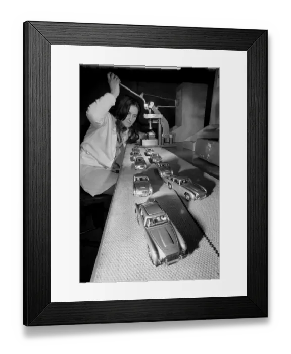 Framed Print : Aston Martins toy cars being produced at Corgis Swansea factory Framed Print : Aston Martins toy cars being produced at Corgis Swansea factory