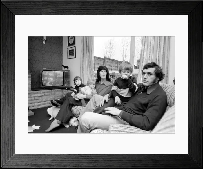 Framed Print : Gloucester prop Mike Burton with wife Pat and children. January 1975 75-00341 Framed Print : Gloucester prop Mike Burton with wife Pat and children. January 1975 75-00341