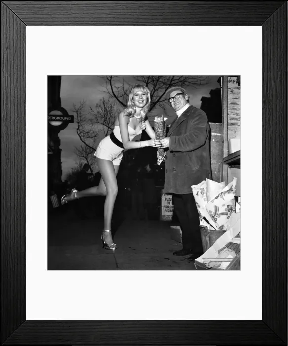 Framed Print : A London flower seller says it with flowers when he met model Christine Donna Framed Print : A London flower seller says it with flowers when he met model Christine Donna