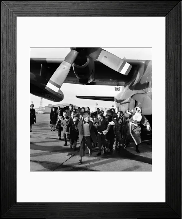 Framed Print : Father Xmas with the children of servicemen at R. A. F. Lyneham. December 1974 74-7607 Framed Print : Father Xmas with the children of servicemen at R. A. F. Lyneham. December 1974 74-7607