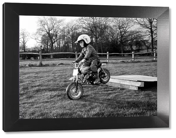 4 years old Jan Dixon on his mino motor bike. December 1974 74-7664-006