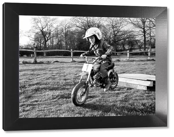 4 years old Jan Dixon on his mino motor bike. December 1974 74-7664-003