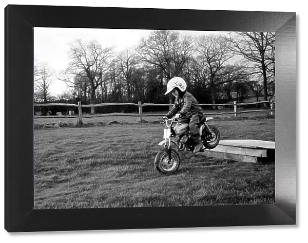 4 years old Jan Dixon on his mino motor bike. December 1974 74-7664-005