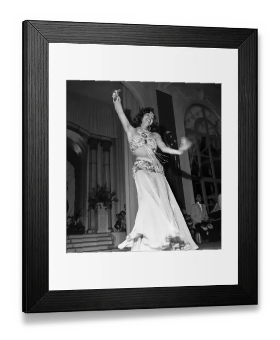 Framed Print : Samia Gamal dances a Belly Dance at Franco Egyptian Gala in Deauville Casino before H. M