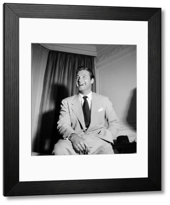 Framed Print : Lex Barker Actor who stars in the film Tarzan. Seen here in this London hotel room Framed Print : Lex Barker Actor who stars in the film Tarzan. Seen here in this London hotel room