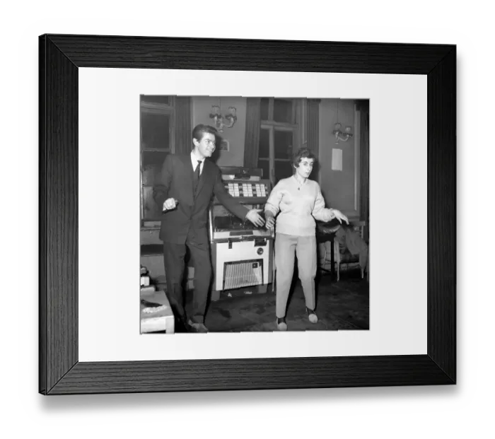 Framed Print : Couple dancing to music from juke box. 1960