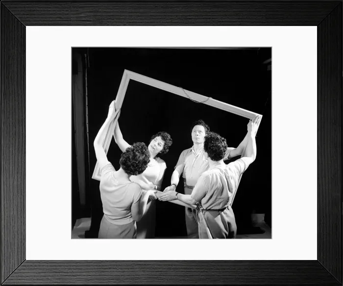 Framed Print : Mirror image: A couple argue in front of a mirror. 1958 Framed Print : Mirror image: A couple argue in front of a mirror. 1958