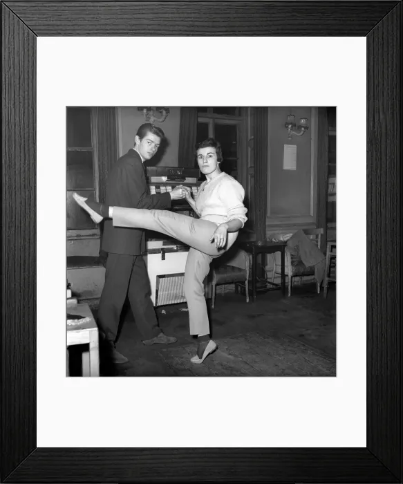 Framed Print : Couple dancing to music from juke box. 1960