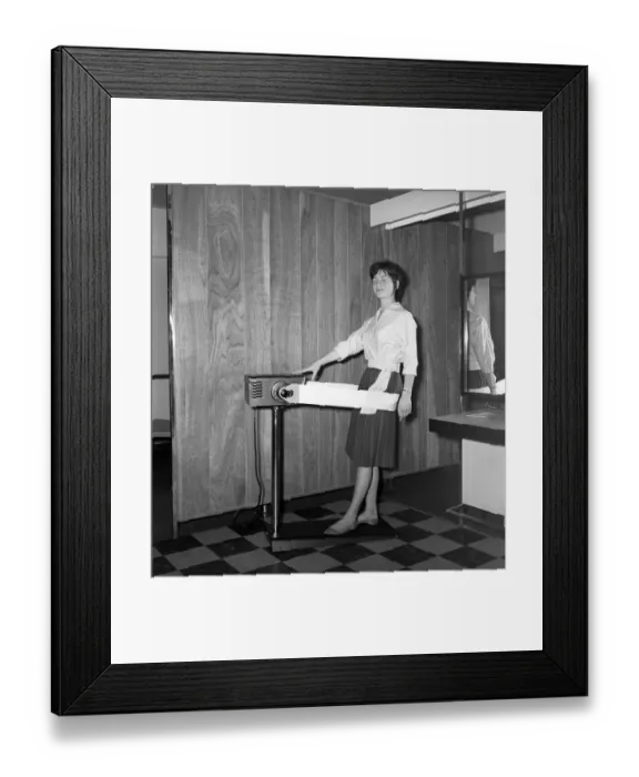 Framed Print : Woman at the John London Hair and Beauty Saloon seen here using a band vibrating slimming Framed Print : Woman at the John London Hair and Beauty Saloon seen here using a band vibrating slimming