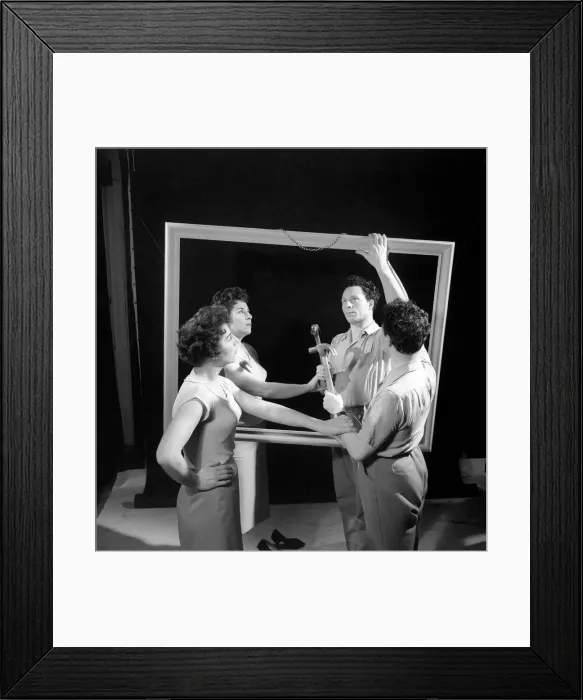 Framed Print : Mirror image: A couple argue in front of a mirror. 1958 Framed Print : Mirror image: A couple argue in front of a mirror. 1958